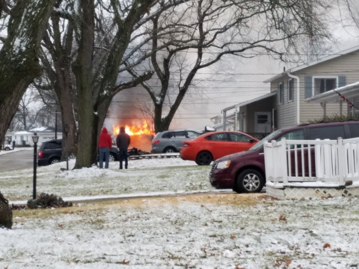 New details West Burlington standoff ends after suspect sets house on fire